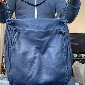 Dark blue genuine leather bag.